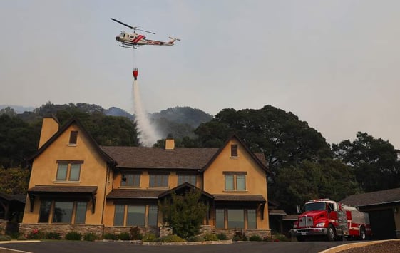 PressDem_CalFire_dropswater_house_SantaRosa.jpg